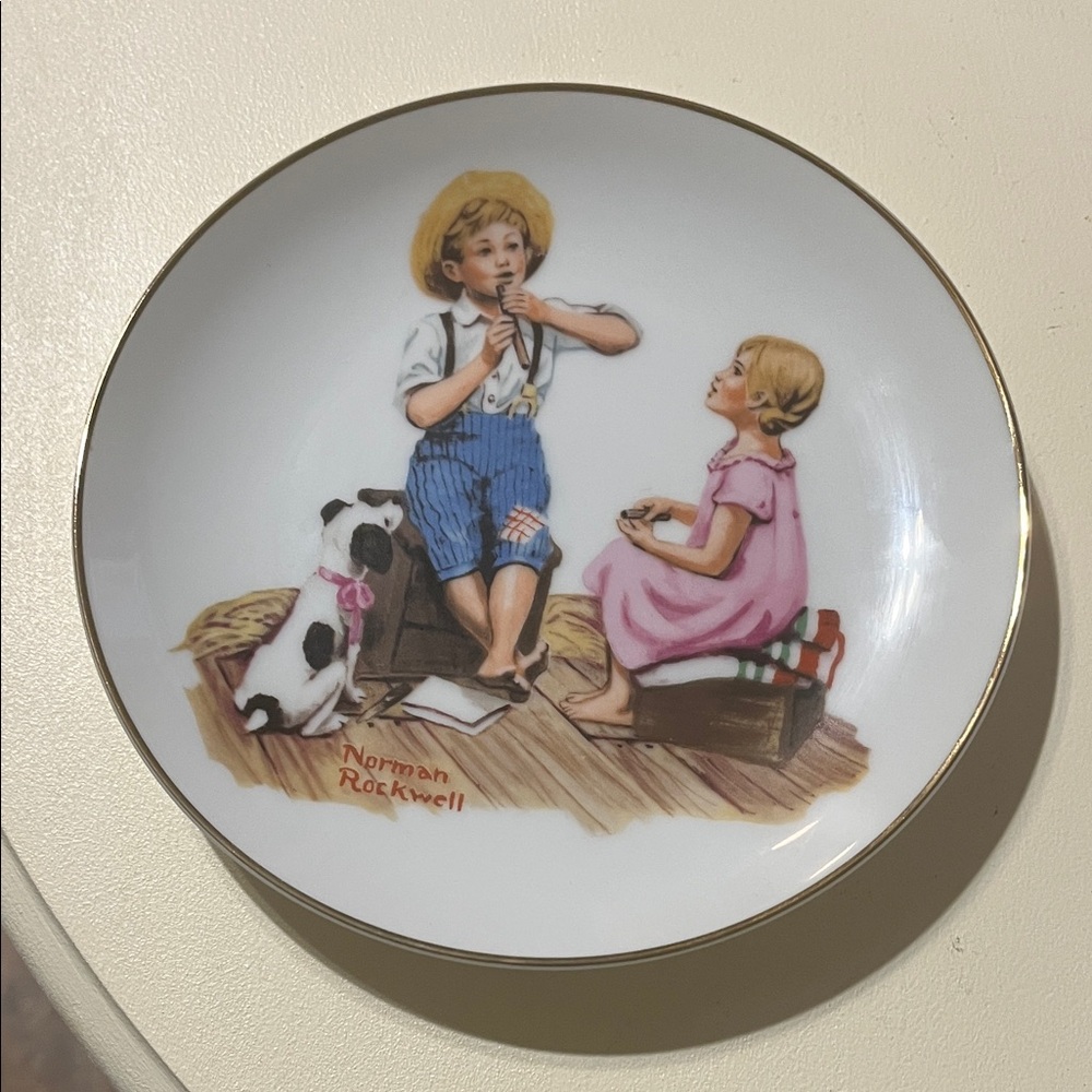 Norman Rockwell Decorative Plate with Pink, Blue, Yellow, Brown and White